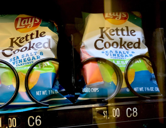 Cinematic shot of salt and vinegar chips in the vending machine.