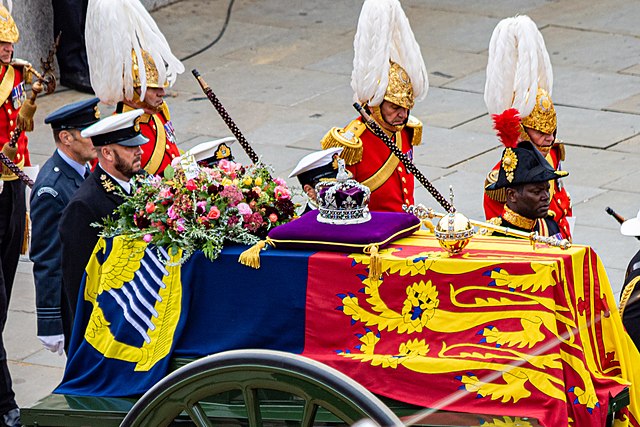 Elizabeths crown sits atop her royal coffin during her funeral procession