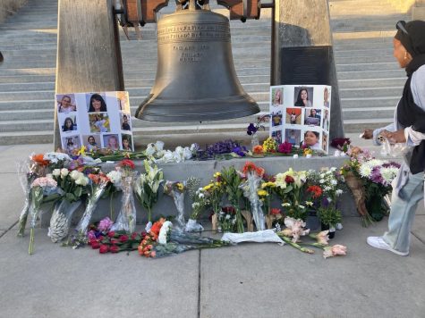 At the Boise capitol building, flowers are placed next to the photos of those killed in the mass shooting at Robb Elementary School in Uvalde, Texas