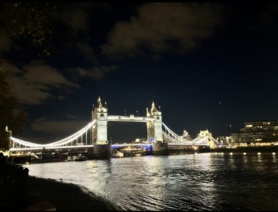 The iconic London Tower Bridge provides sharp contrast against the dark London sky. 