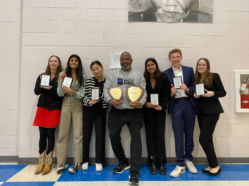 Timberline%E2%80%99s+Speech+and+Debate+team+hold+their+awards+from+the+tournament+%0A%28left+to+right%3A+Ize+Upham%2C+Divya+Elancheren%2C+Jisong+Ryu%2C+Coach+Molet%2C+Blessy+Bellamkonda%2C+Brady+Dunn%2C+Cara+Halford%29+