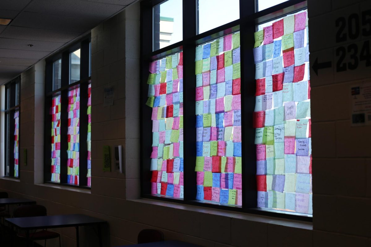 Gratitude notes decorate the windows of the science hall.