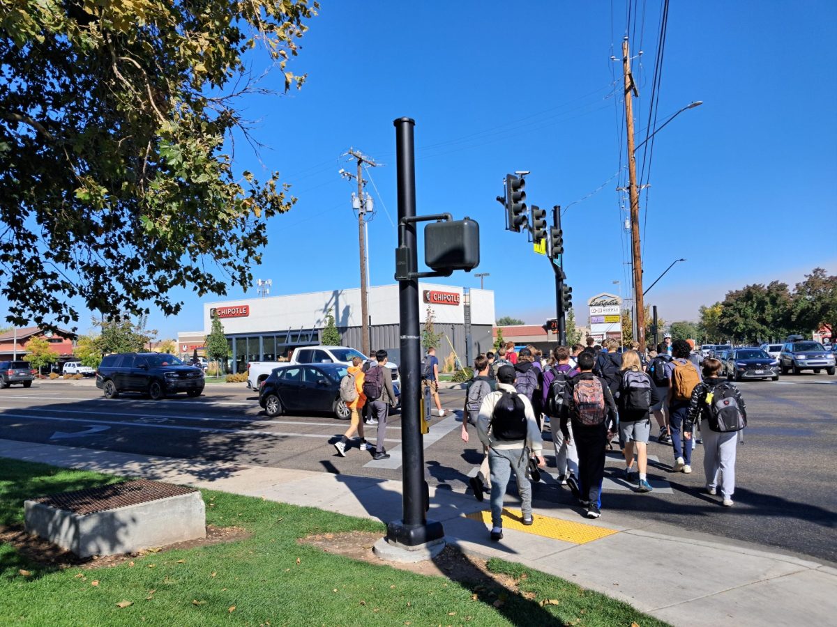 Lots of students crossing the street during friday lunch