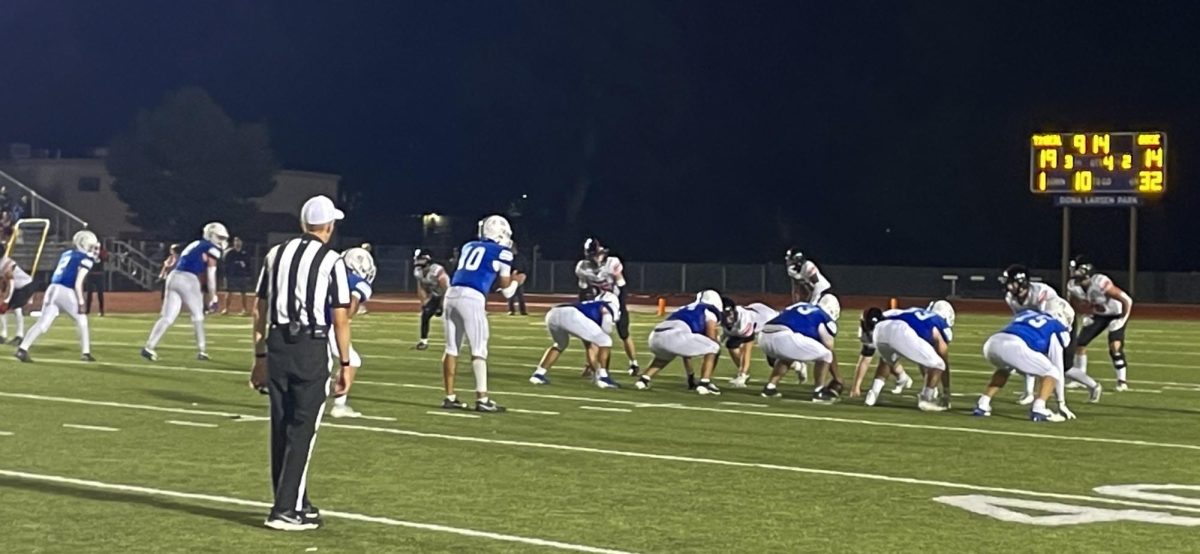 Jack Brant Leading the Wolfpack Down the Field
