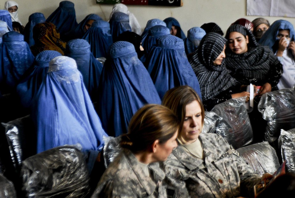 Women from the Kunar Provincial Reconstruction Team and Iowa National Guard’s 734th Agribusiness Development Team gather alongside Afghan women to celebrate International Women’s Day at the Ministry of Culture