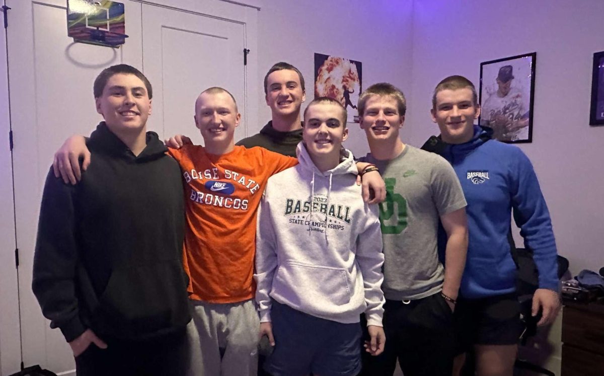 Eli and friends with buzzed hair