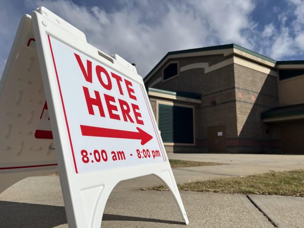 Sign pointing to a polling place in Columbia Village, Boise, ID.