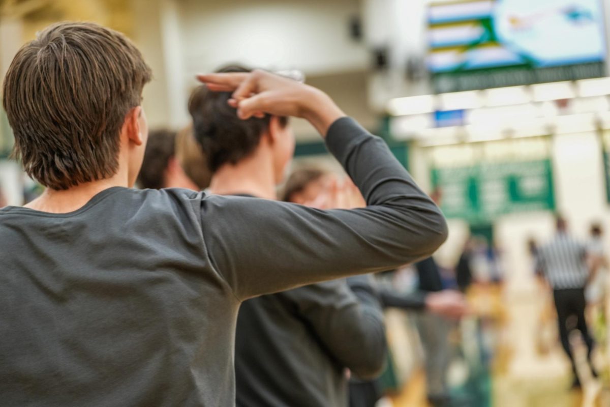 Timberline bench celebrating a big Kole Hudson (Jr.) 3-pointer late in the third period.