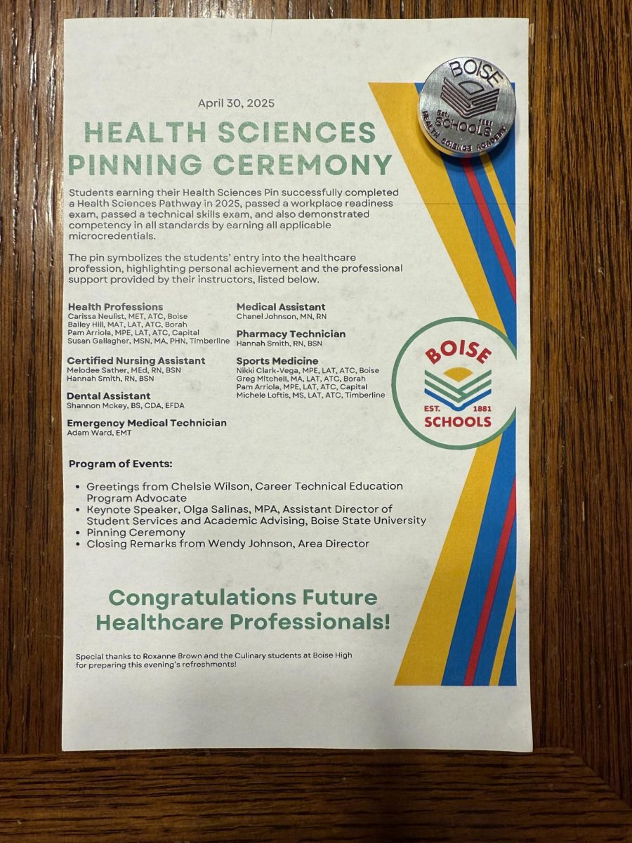 Health care pinning ceremony pamphlet and pin.
