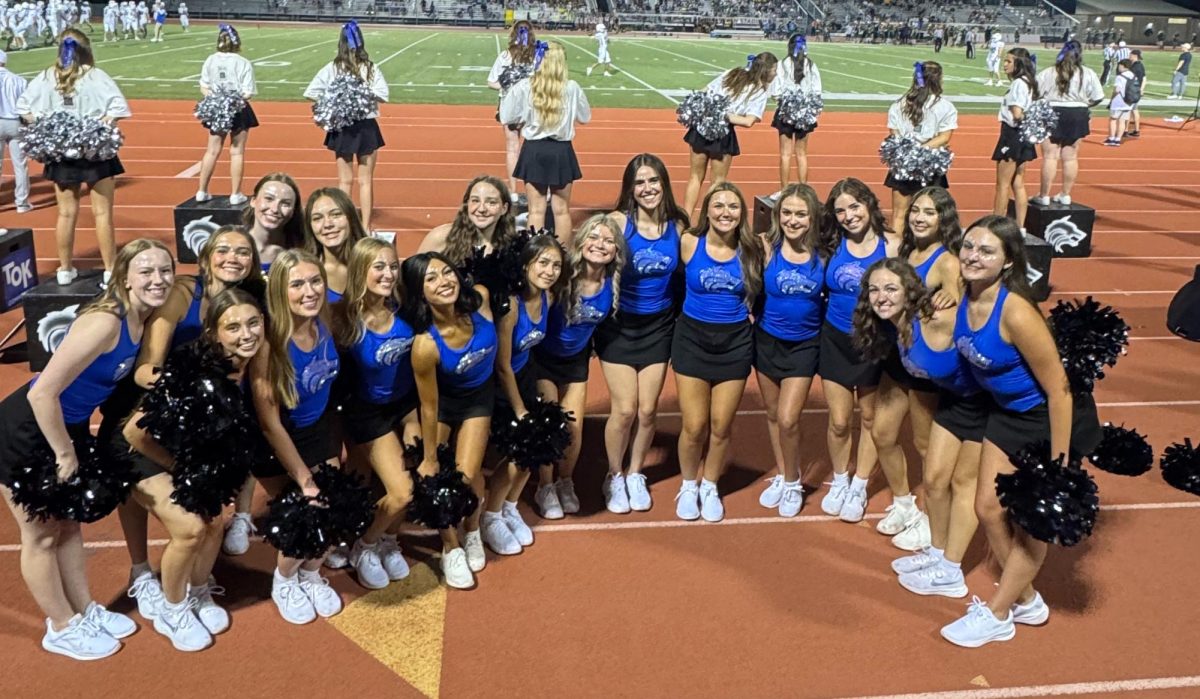 Part of the Silver Legacy team after cheering during this year's first football game.