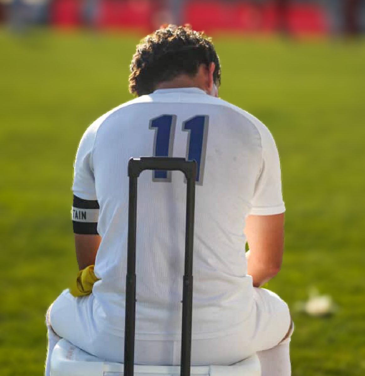 Kai Anitok (Sr.) is taking a water break at halftime.