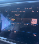 Taylor Swifts new song playing on the radio.